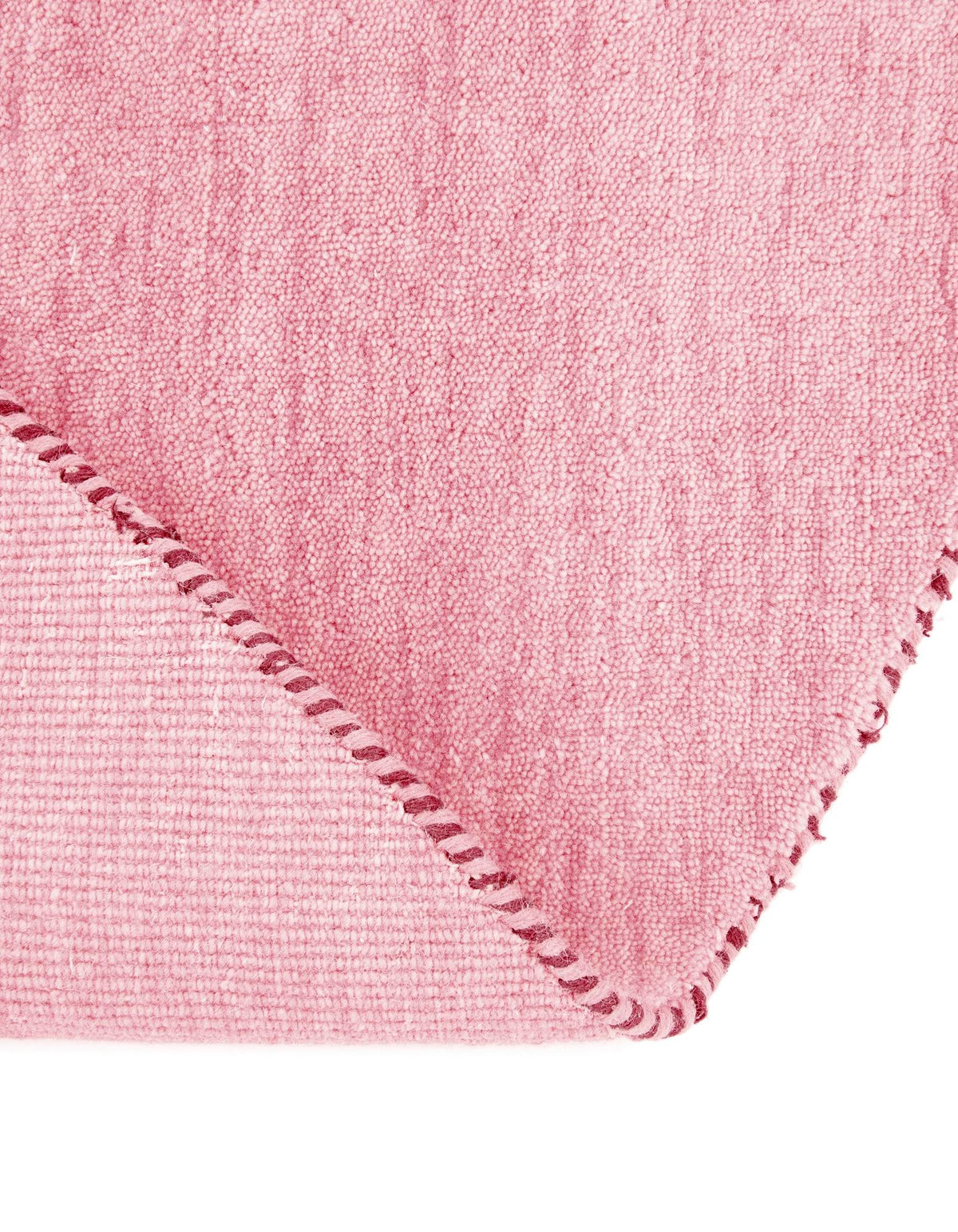 Wolle Teppich Solid Gabbeh in Rosa von Hadorn™ - Lifestyle Image