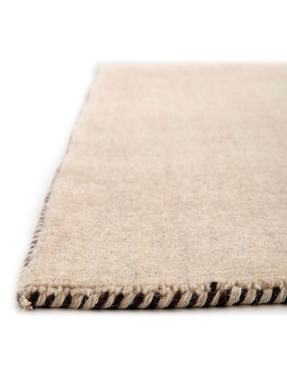 Wolle Teppich Solid Gabbeh in Beige von Hadorn™ - Lifestyle Image