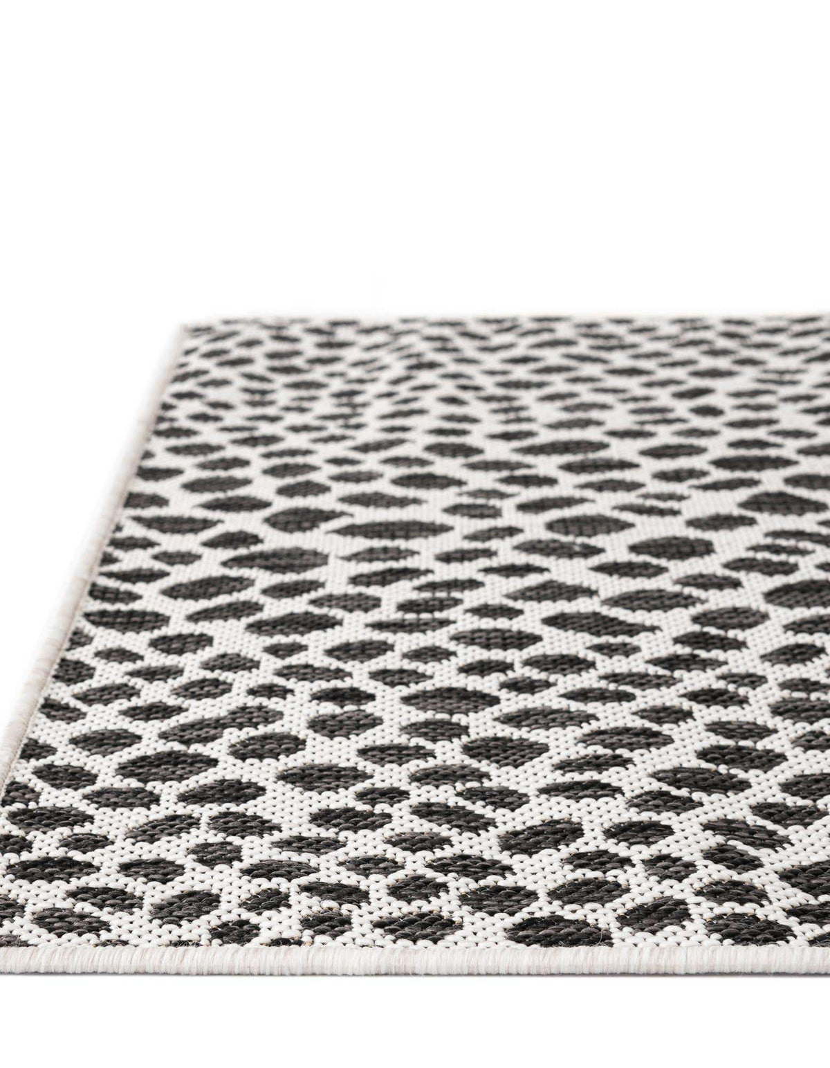 Rechteck Outdoor Teppich Tulum Outdoor in Schwarz von Hadorn™ - Lifestyle Image