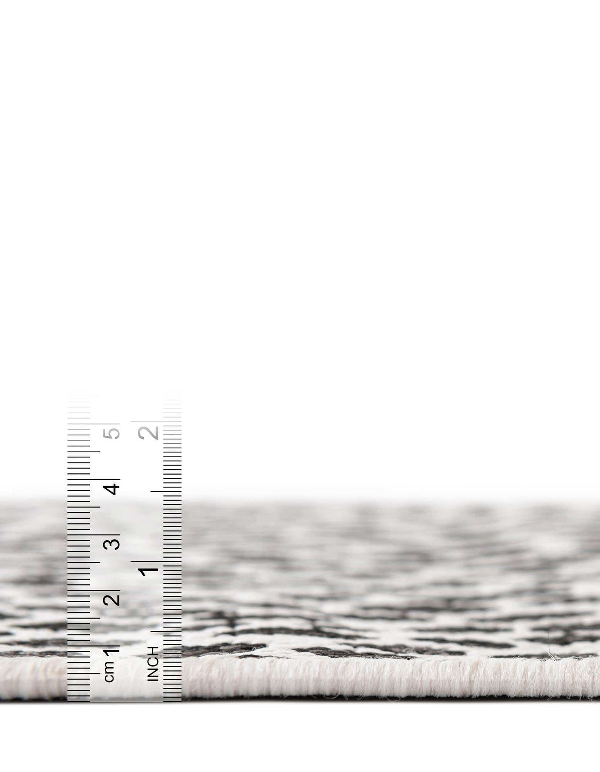 Achteck Outdoor Teppich Tulum Outdoor in Schwarz von Hadorn™ - Lifestyle Image